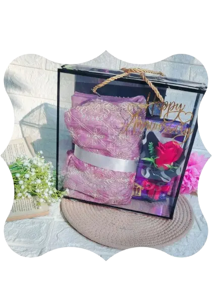 it is a hamper with dress chocolate and a mini bouquets 